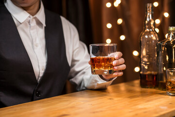 Bartender Serve Whiskey, on wood bar, 