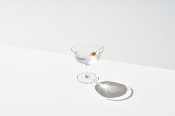 Dry martini cocktail with olive