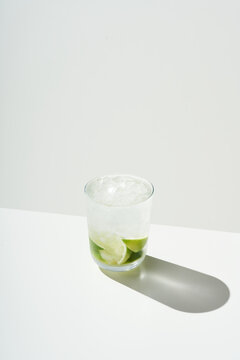 Caipirinha cocktail with ice and lime