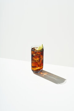 Glass of Rum and Coke cocktail
