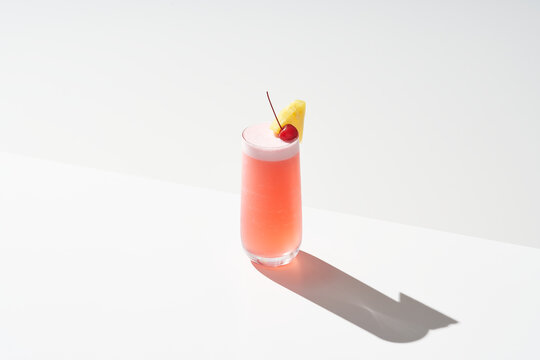 Glass of Singapore Sling cocktail
