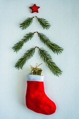 Christmas tree with gifts on the table fiat lay