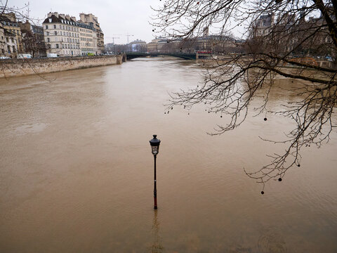 Rising floods, water flooding city of Paris, River Seine