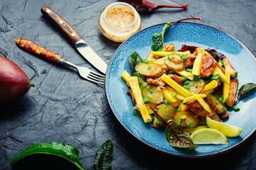 Fried chicken breast and mango