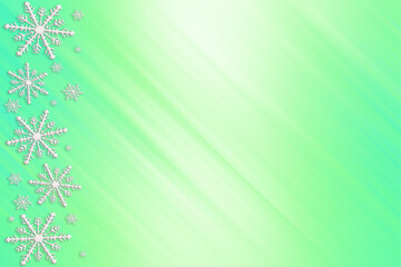 Winter turquoise green mint saturated bright gradient background with random snowflakes sideways and with diagonal light stripes. Christmas, New Year card with copy space.