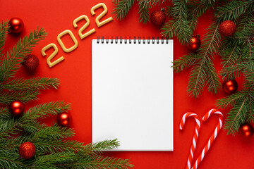 Fototapeta na wymiar blank text, Christmas and New Year concept, pen and notebook with blank sheet copy space, Xmas holiday banner. Top view. New 2022 Year greeting card