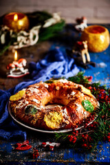 Obraz na płótnie Canvas Bolo Rei .Traditional Portuguese Christmas cake on a Christmas rustic background