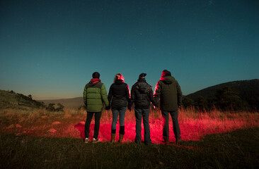 Friends looking at the stars