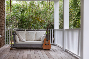 Porch of Home with acoustic Guitar 