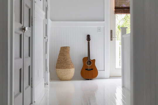 Luxury Home interior with acoustic guitar in room 