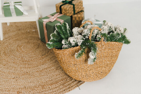Christmas and New Year decoration with the Wicker bag. Christmas concept. Christmas ornaments in wicker basket.