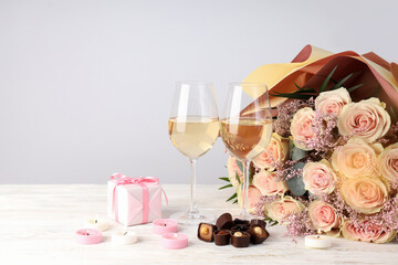 Happy Valentine day composition on white wooden table