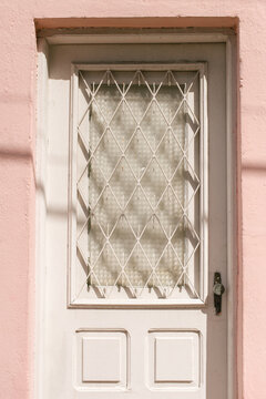 White Door In Pink House