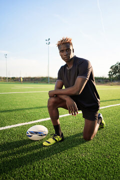 Black man with rugby ball