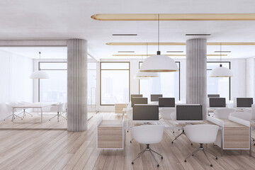 Modern industrial coworking loft office interior with furniture, computer monitors, wooden, flooring and window with city view and daylight. Workplace and no people concept. 3D Rendering.