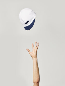 sports hat thrown in air