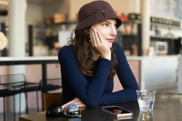 Smiling woman in cafe
