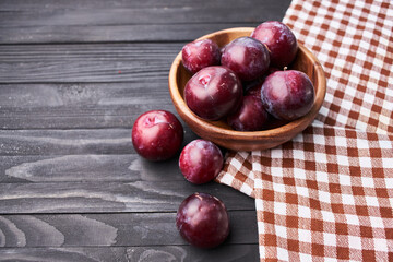 plums fruits natural products on a wooden table top view