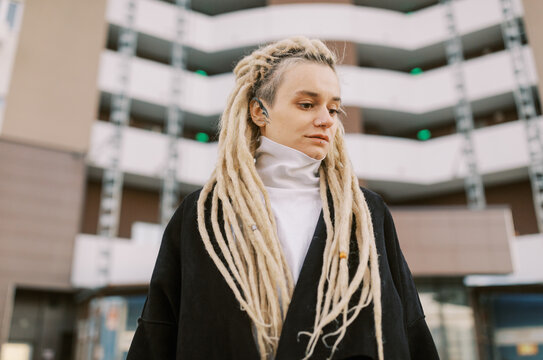 Winter Portrait of young woman with dreadlocks 