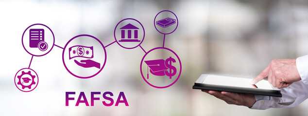 Fafsa concept with man using a tablet