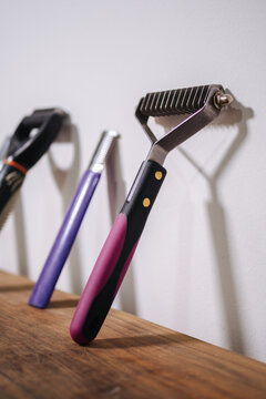 Various grooming tools near wall