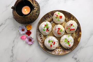 Rasmalai or Malai Sandwich, Roshmolai, Rasamalei is very popular Indian dessert. A sweet malai stuffing inside Rasgulla. It's a sweet delicacy made with Indian cottage cheese or chenna. Copy space.