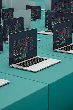 Laptop showing stock market statistics on screen