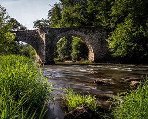 Fototapeta na wymiar Beautiful bidgre over a river in South of France