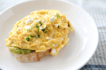 Avocado and scrambled eggs toast