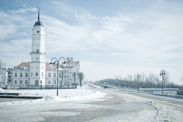 Snowy winter landscape with historical building of city hall of Mogilev, Belarus. Central city...