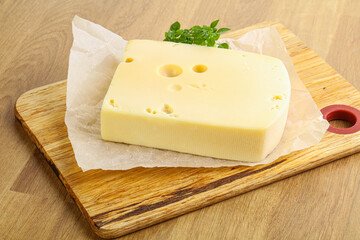 Maasdam cheese over the board