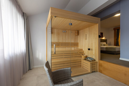 Small wooden sauna in a hotel room