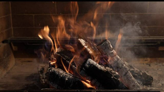 Fire flame in slow motion. Hot coals before cooking meat. Family concept. 4K in slow motion. Flame in brazier