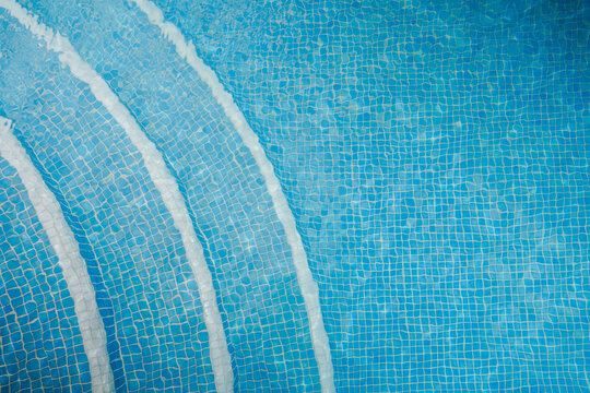  A swimming pool with blue mosaics.