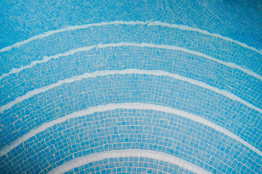  A swimming pool with blue mosaics.