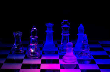 Glass chess on glass board	
