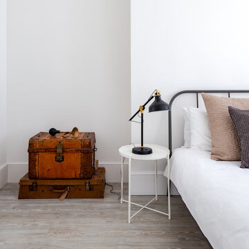 Bedside table and suitcases