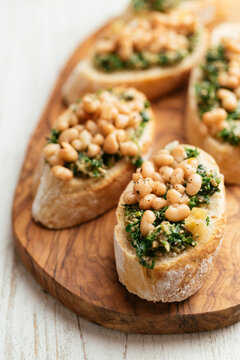 Kale pesto and white bean bruschetta
