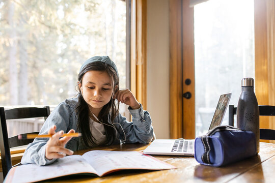Young Girl Does Homework