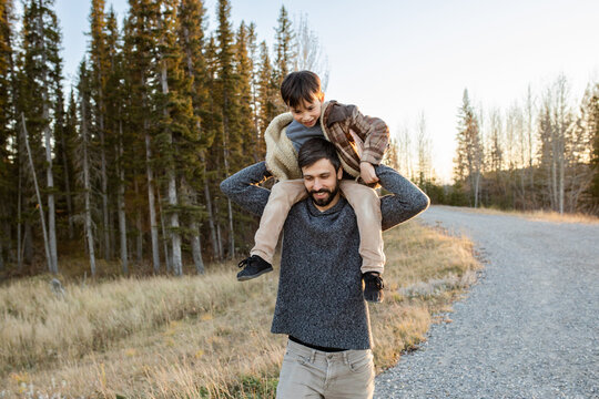 Son On Fathers Shoulders