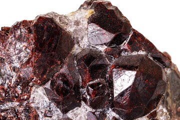Macro stone garnet mineral on white background