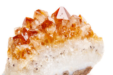 Macro mineral stone Citrine in rock in crystals on a white background