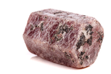 Macro mineral stone Ruby in the breed a white background