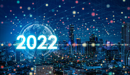 New year 2022 or start straight concept.Modern city with wireless network connection and cityscape...