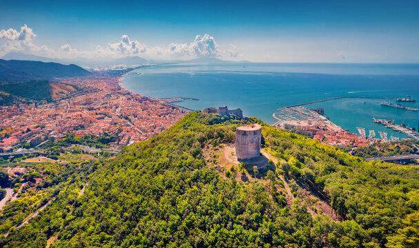 Attractive summer view from flying drone of Bastiglia tower and Arechi Castle. Picturesque morning cityscape of Salerno town, Italy, Europe. Traveling concept background.