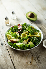 Healthy green salad with artichoke and avocado