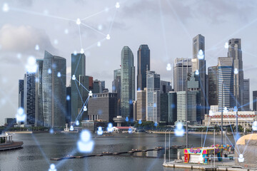 Social media icons hologram over panorama city view of Singapore, Asia. The concept of people...