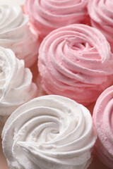 Many pink and white delicious zephyrs, closeup view