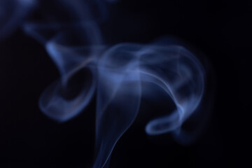 Movement of white smoke isolated on black background..