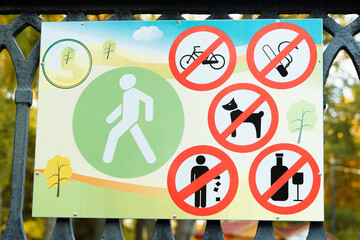poster with prohibitory signs in the park